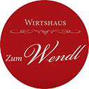 Rundes Logo des Wirtshauses Zum Wendl mit rotem Hintergrund und weißer Schrift.