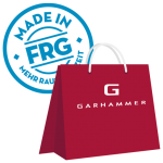 Rote Tragetasche mit dem Garhammer-Logo und einem Made in FRG-Siegel.