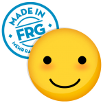 Lächelndes Emoji mit dem Aufkleber 'Made in FRG' in blauer Schrift.